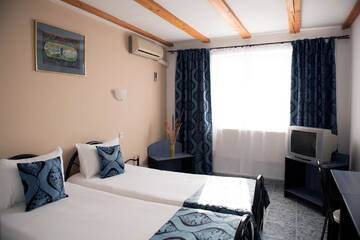 Фото номера Двухместный номер с 1 кроватью Курортные отели Cormoran Resort г. Uzlina 5